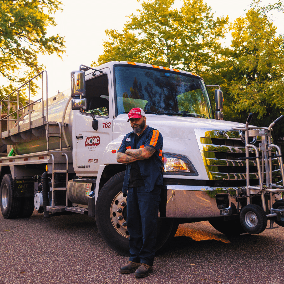 driver with used cooking oil collection truck